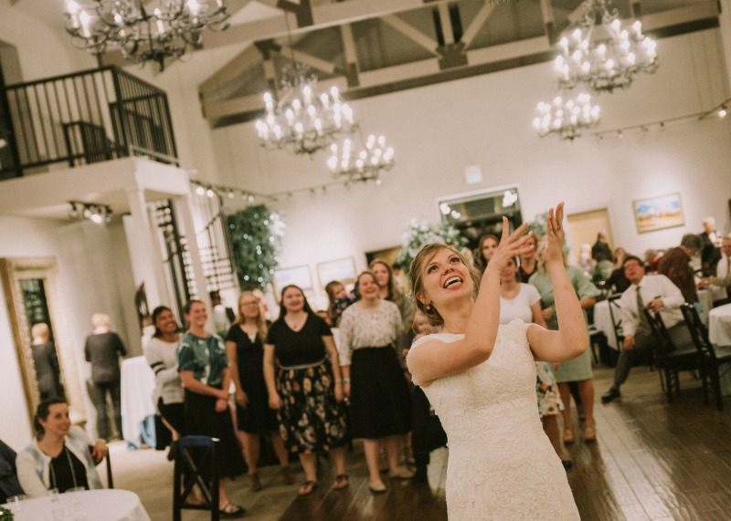 tossing the bridal bouquet at salt lake city wedding